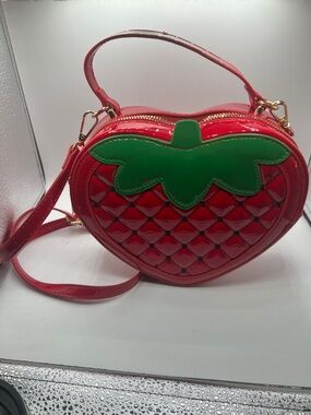 Love Notes Red Patent Strawberry Heart Crossbody with Green Leaf Accent